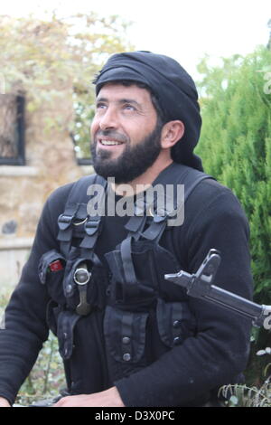 A Free Syrian Army Rebel takes a break from fighting Stock Photo