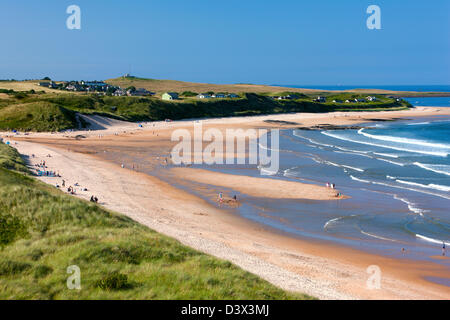 View over Embleton Bay towards Low Newton-by-the-Sea, Northumberland Stock Photo