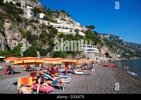 Tourists on the beach, Amalfi, Province Of Salerno, Gulf Of Salerno, Tyrrhenian Sea, Campania, Italy Stock Photo