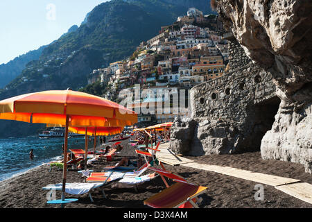 Tourists on the beach, Amalfi, Province Of Salerno, Gulf Of Salerno, Tyrrhenian Sea, Campania, Italy Stock Photo