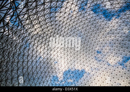 Abstract metallic background and blue sky at Montreal Biosphere. Stock Photo