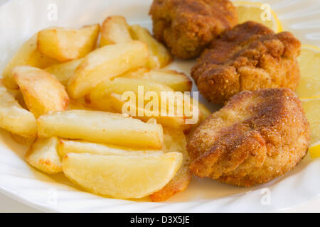 Tasty French Fries with breadbrain Stock Photo