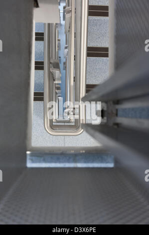 Vertigo anxiety and fear of heights a 6 floor stairwell trapped Stock Photo