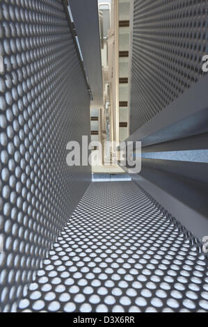 Vertigo anxiety and fear of heights a 6 floor stairwell trapped Stock Photo