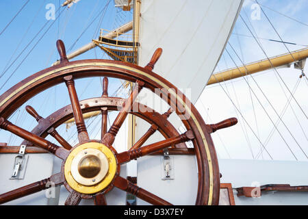 Ships helm on deck of a clipper ship, Italy Stock Photo