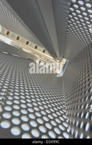 Vertigo anxiety and fear of heights a 6 floor stairwell trapped Stock Photo