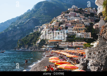 Tourists on the beach, Amalfi, Province Of Salerno, Gulf Of Salerno, Tyrrhenian Sea, Campania, Italy Stock Photo