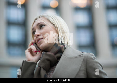 Woman speaking on cell phone downtown Washington DC Stock Photo