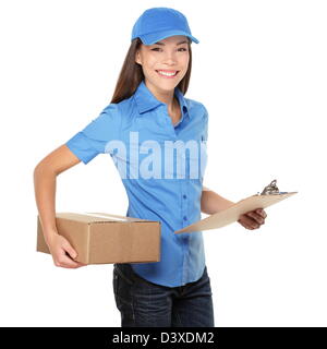 Beautiful young mixed race Caucasian / Chinese Asian female delivery person delivering packages while holding clipboard Stock Photo