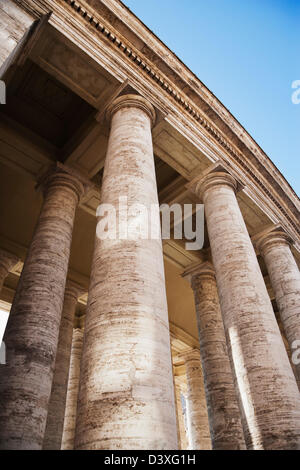 Low angle view of Berninis Column, St. Peters Square, Vatican City Stock Photo