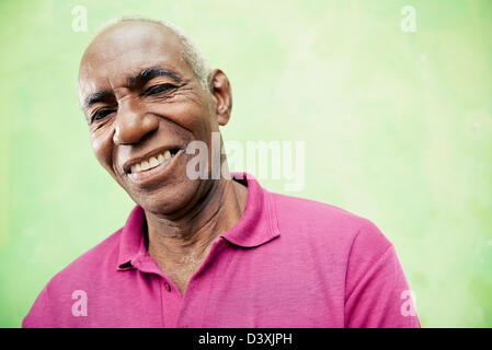 Old people and emotions, portrait of senior african american man looking and smiling at camera. Copy space Stock Photo