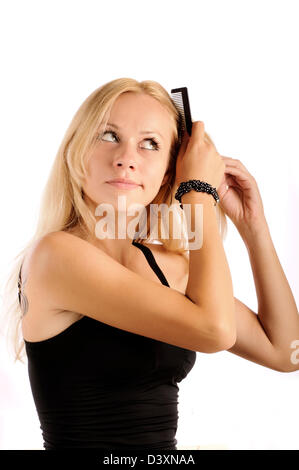 Combing hair Stock Photo