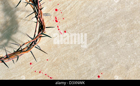 Crown of thorns with blood on grungy background Stock Photo