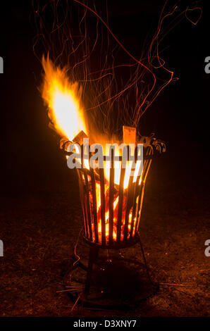 Fire basket, spark trails Stock Photo