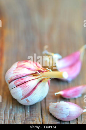 garlics on wooden background Stock Photo