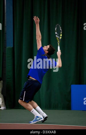 Cardiff, Wales, UK. Tuesday 26th February 2013.  Josh Goodall serving during Josh Goodall v Richard Gabb on day 2 of the Aegon GB Pro-Series at Welsh National Tennis Centre, Cardiff, Wales, UK on 26th February 2013. Gabb beat Goodall 6-3 7-6. Credit: Toby Andrew/Alamy Live News Stock Photo