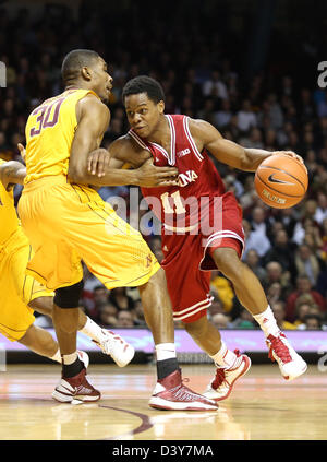 Minneapolis, USA. 26th February 2013. Indiana Hoosiers guard Kevin Ferrell (11) drives by Minnesota Gophers forward Andre Ingram (30) during the NCAA basketball game between the Minnesota Gophers and the Indiana Hoosiers at Williams Arena in Minneapolis, Minnesota.  Credit:  Cal Sport Media / Alamy Live News Stock Photo