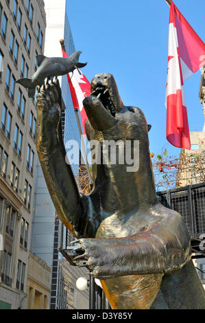 Iconic bear with fish statue at Sparks Street Mall entrance in downtown Ottawa Ontario Canada National Capital City Stock Photo