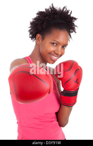 Portrait of a fitness woman wearing boxing gloves, isolated on white background Stock Photo