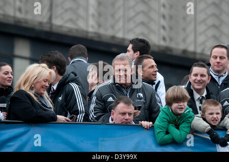 Swansea, Wales, UK. 26th February 2013. First Team Coach Alun Curtis and Swansea City Football team celebrate during an open-top bus parade through the centre of Swansea after beating Bradford City 5-0 in Sunday's Capital One Cup final at Wembley to win the Capital Cup trophy. Credit:  Phil Rees / Alamy Live News Stock Photo