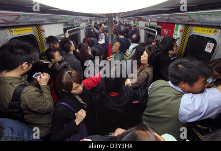 Hong Kong, China, People in a subway Stock Photo