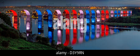 The Royal Border Bridge at Berwick-upon-Tweed illuminated at night in Union Flag livery Stock Photo