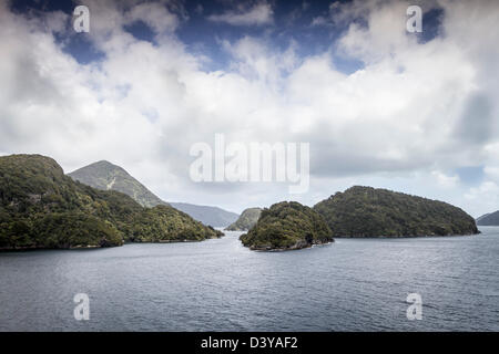 Clouds over the Spectacular Milford Sound, South Island, New Zealand Stock Photo