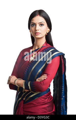 Traditionally Indian woman posing in sari Stock Photo - Alamy