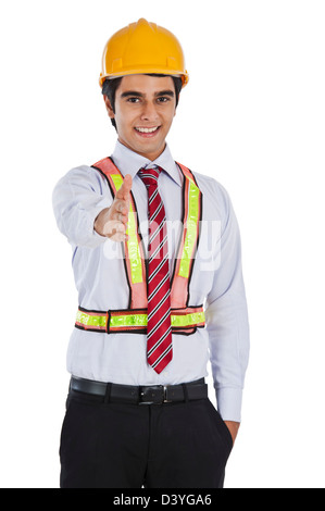 Businessman extending hand for handshake Stock Photo