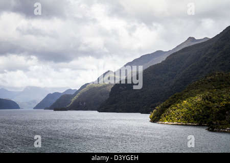 Clouds over the Spectacular Milford Sound, South Island, New Zealand Stock Photo