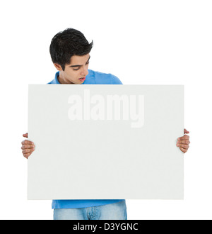Man looking at a whiteboard Stock Photo