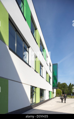 Oasis Academy, Coulsdon, United Kingdom. Architect: Sheppard Robson, 2011. Facade perspective with coloured panels. Stock Photo