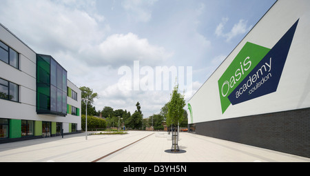 Oasis Academy, Coulsdon, United Kingdom. Architect: Sheppard Robson, 2011. Schoolyard and building with signage. Stock Photo