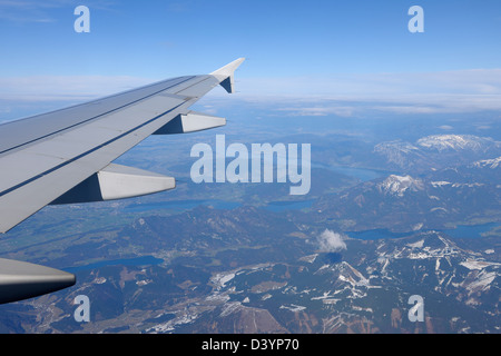 Airplane Wing, Flying Over the Lakes in Salzkammergut, Austria Stock Photo