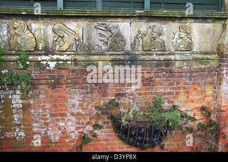 Stone carving fresco depicting the season of March, Cloverley Hall, Calverhall, Whitchurch, Shropshire, England, Britain Stock Photo