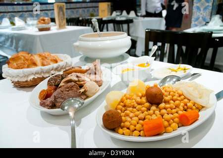 Cocido madrileño in a typical restaurant. Madrid, Spain. Stock Photo