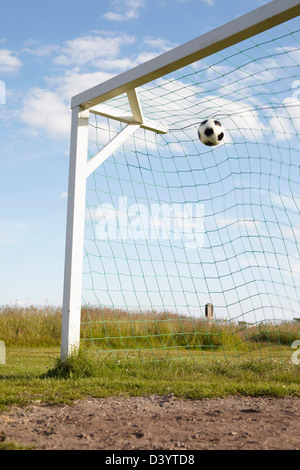 Soccer Net and Soccer Ball, Lysekil, Vastra Gotaland County, Bohuslaen, Gotaland, Sweden Stock Photo