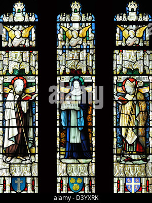 Stained glass window depicting Saints from the North East of England, the Parish Church of the Holy Trinity, Skipton, Yorkshire Stock Photo