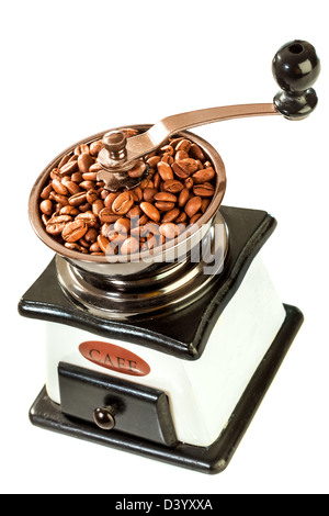 Vintage coffee grinder with coffee beans Stock Photo