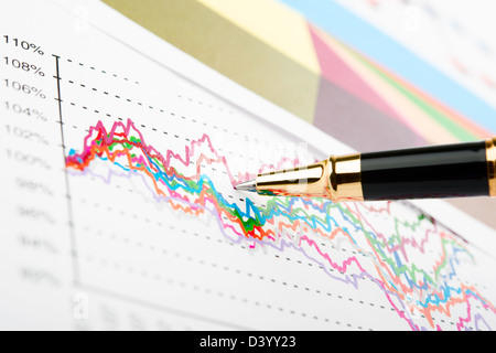 Pen showing a diagram on a report Stock Photo