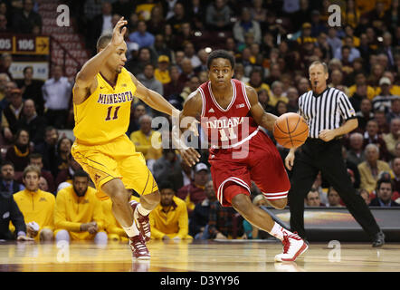 Minneapolis, USA. 26th February 2013. Indiana Hoosiers guard Kevin Ferrell (11) is guarded by Minnesota Gophers guard Joe Coleman (11) during the NCAA basketball game between the Minnesota Gophers and the Indiana Hoosiers at Williams Arena in Minneapolis, Minnesota. Credit:  Cal Sport Media / Alamy Live News Stock Photo