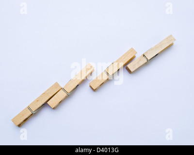 Wooden clothes clips isolated on white background Stock Photo
