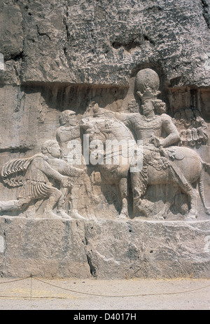 Iran. Naqsh-e-Rustam. Necropolis. Sassanid period. The triumph of Shapur I (241-272) (on horseback). Stock Photo