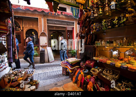 Commerce of Arab products in the called street of the tearooms,View from inside the shop, Granada, Spain Stock Photo