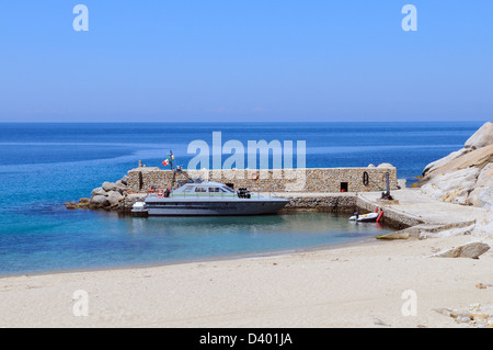 Italy Tuscany Montecristo island  Cala Maestra with boat ranger Tuscan   Archipelago national park Stock Photo