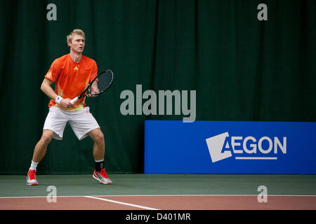 Cardiff, UK. Wednesday 27th February 2013.  Davy Sum returns during Round 2 of the ITF Aegon GB Pro-Series at Welsh National Tennis Centre, Cardiff, Wales, UK on 27th February 2013. Stock Photo