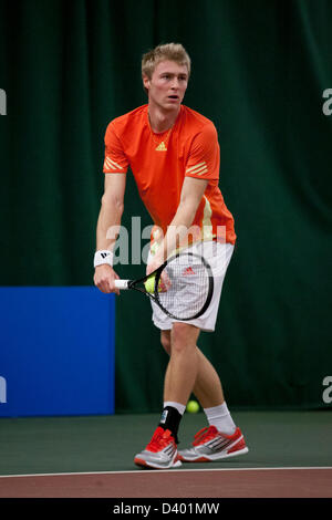 Cardiff, UK. Wednesday 27th February 2013.  Davy Sum serves during Round 2 of the ITF Aegon GB Pro-Series at Welsh National Tennis Centre, Cardiff, Wales, UK on 27th February 2013. Stock Photo