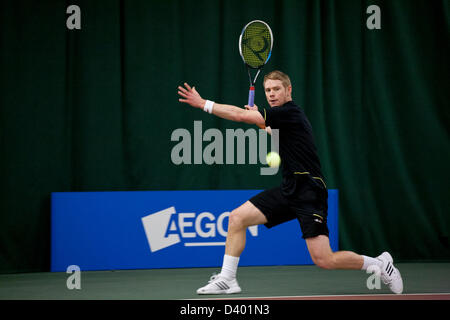 Cardiff, UK. Wednesday 27th February 2013.  Edward Corrie hits a forehand during Round 2 of the ITF Aegon GB Pro-Series at Welsh National Tennis Centre, Cardiff, Wales, UK on 27th February 2013. Stock Photo