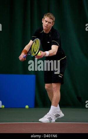 Cardiff, UK. Wednesday 27th February 2013.  Edward Corrie serves during Round 2 of the ITF Aegon GB Pro-Series at Welsh National Tennis Centre, Cardiff, Wales, UK on 27th February 2013. Stock Photo