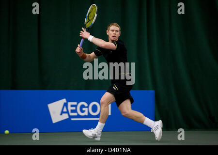 Cardiff, UK. Wednesday 27th February 2013.  Edward Corrie returns during Round 2 of the ITF Aegon GB Pro-Series at Welsh National Tennis Centre, Cardiff, Wales, UK on 27th February 2013. Stock Photo